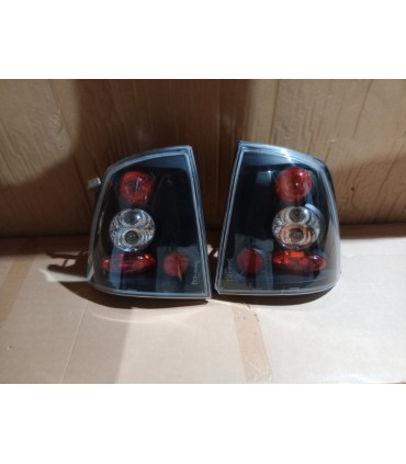 CX PILOTOS PARA OPEL ASTRA G 2P 4P 97-04 FONDO NEGRO LOOK LEXUS R145539C1