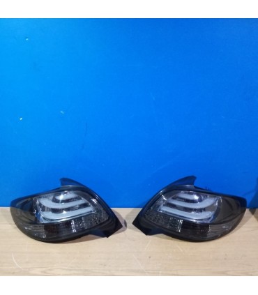 DW PILOTOS PEUGEOT 206 98-09 LIGHT BAR FONDO CROMO AHUMADO R148376C1