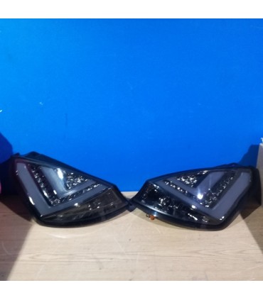 DC PILOTOS FORD FIESTA MK7 08-12 LIGHT BAR FONDO CROMO AHUMADO R148128C1
